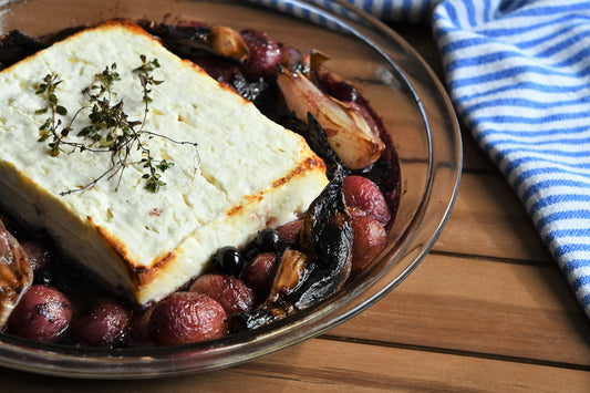 Roasted Feta With Wild Blueberries, Shallots, and Grapes